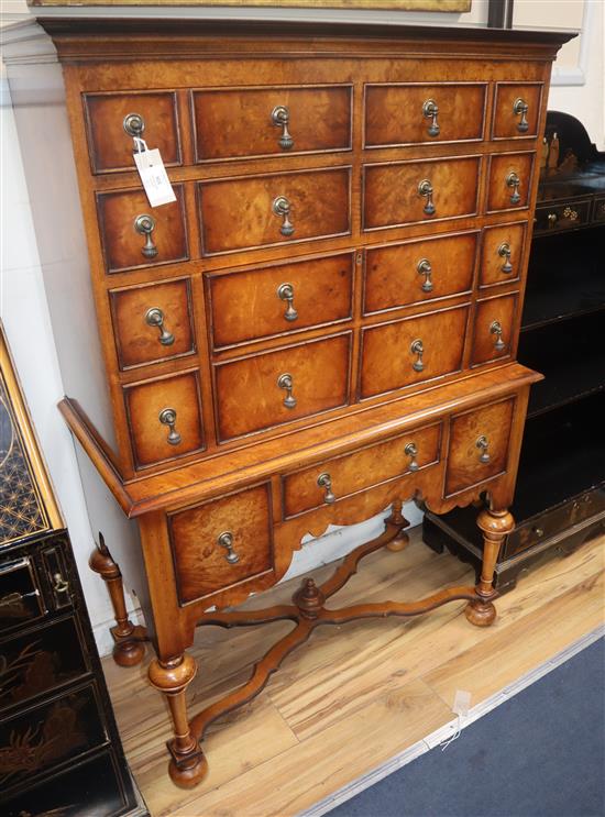 A late 17th century style walnut secretaire cabinet on stand W.94cm